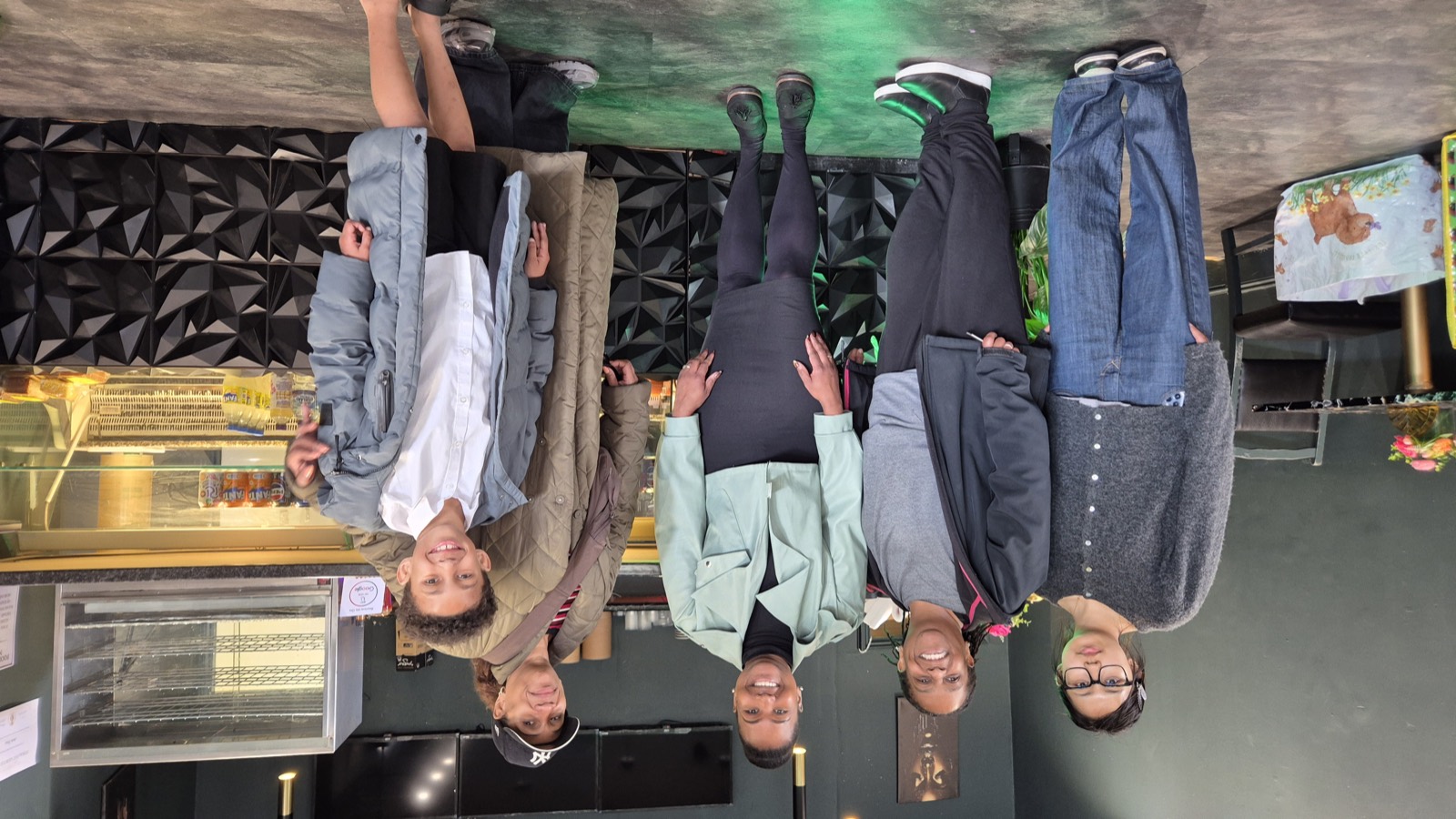 Group photo from S.E.N Mondays at The Jerk Shac